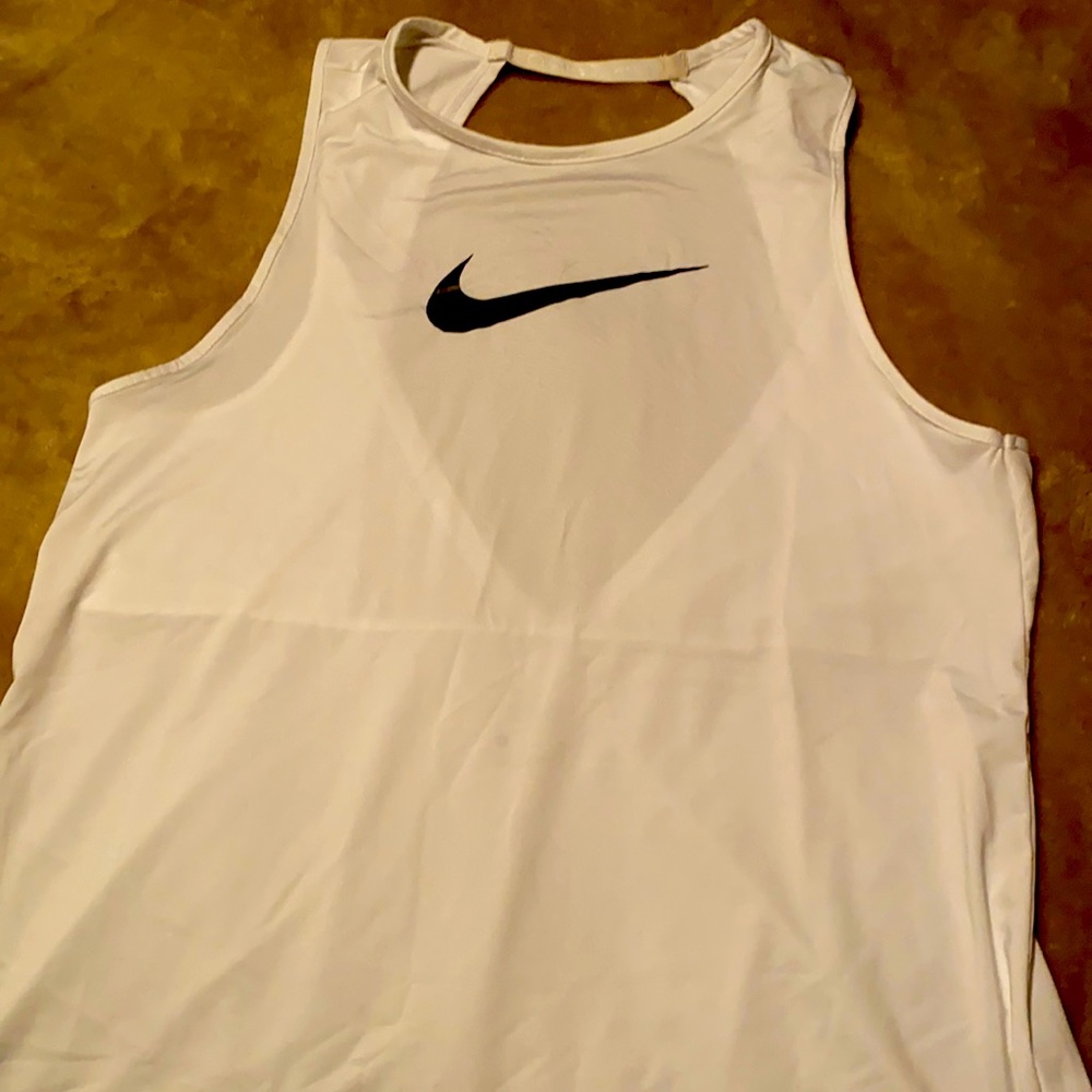Never worn Nike tank, open back with mesh detail, size M